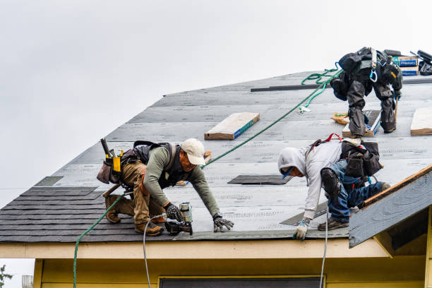Professional Roofing technician working in Delphi, IN